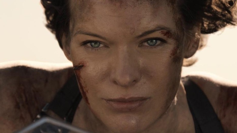 Resident Evil Milla Jovovich peering off into the distance