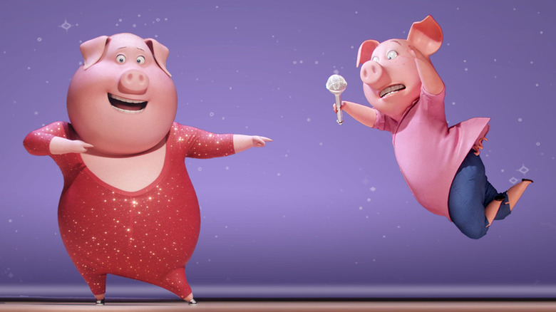 Two pigs performing