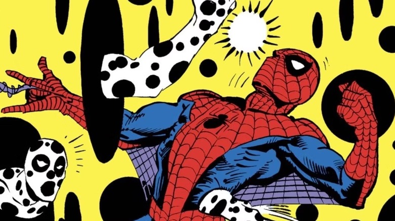 The Spot punches Spider-Man