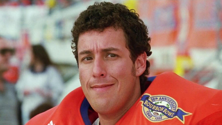 Adam Sandler in a football jersey