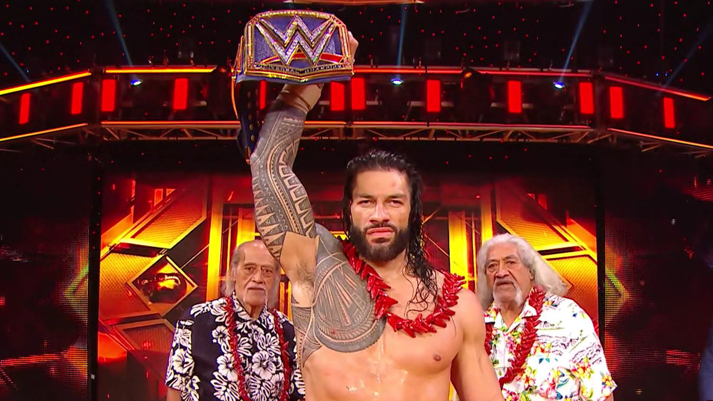 Roman Reigns with his uncle, Afa, and his father, Sika