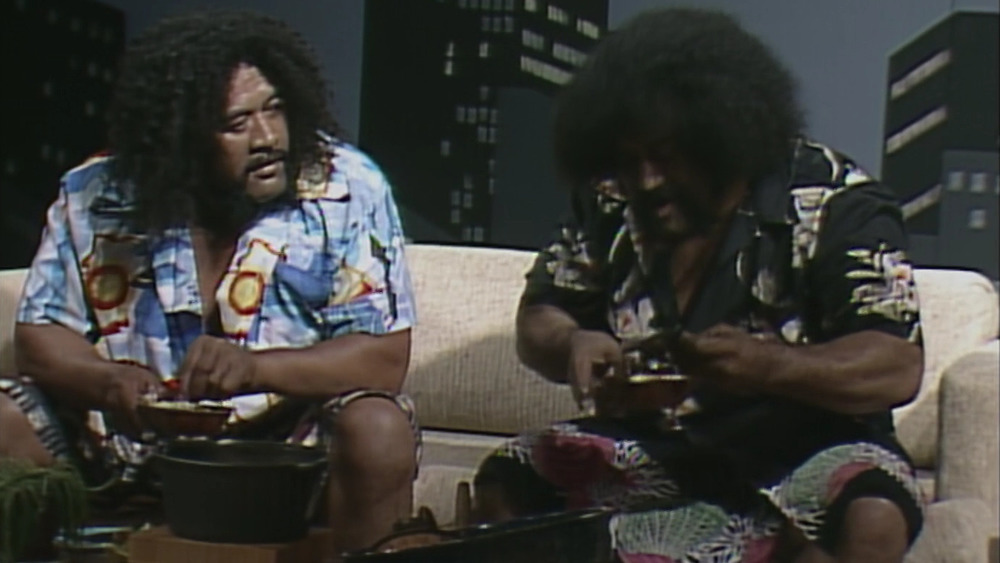 The Wild Samoans eating raw fish on WWF programming