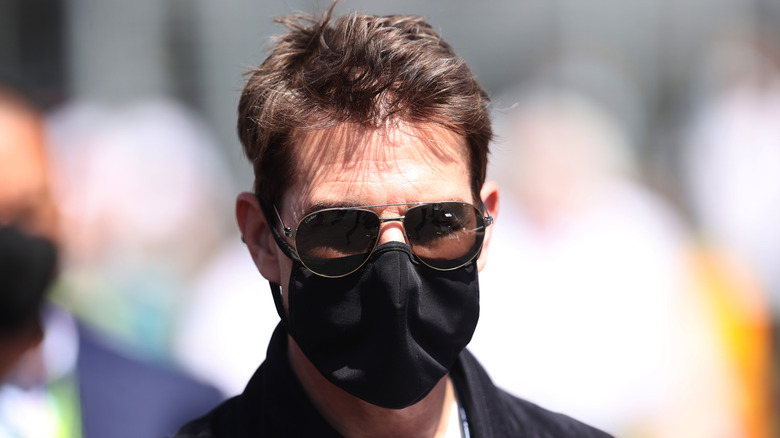 Tom Cruise in a face mask