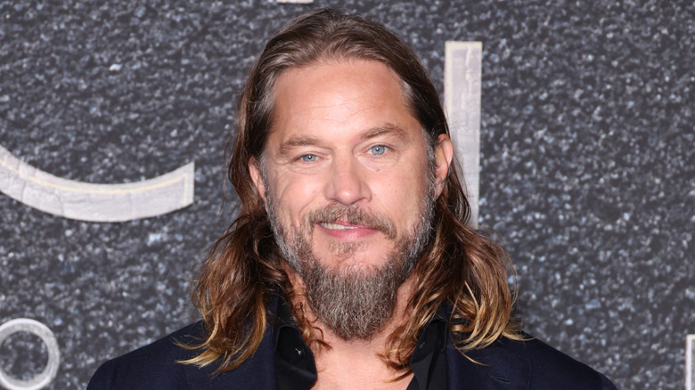 Travis Fimmel smiles for camera