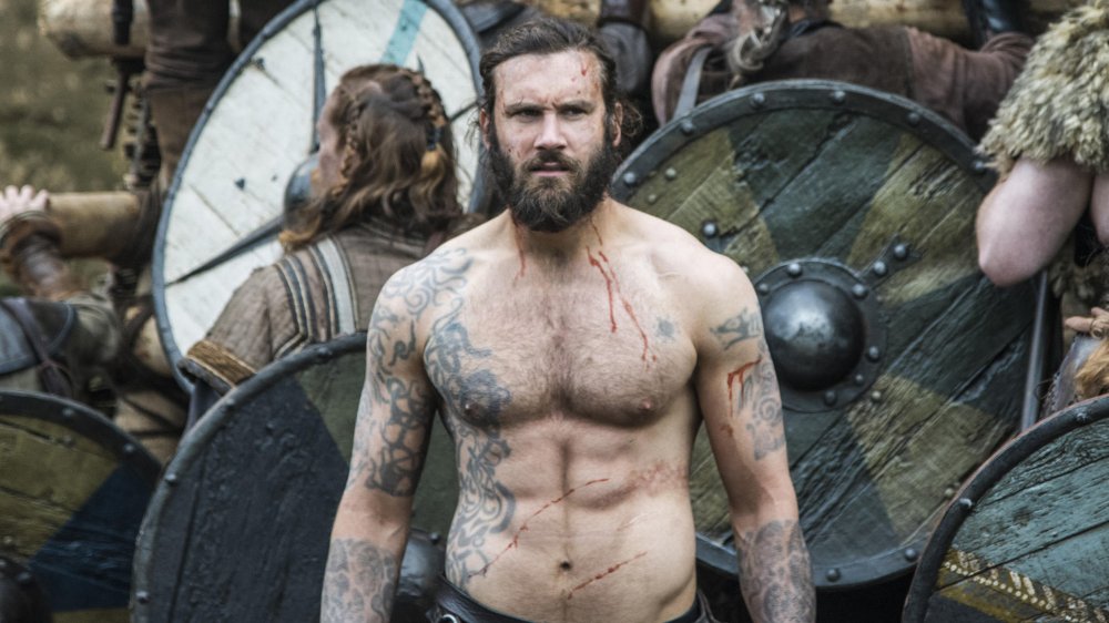 Clive Standen as Rollo shirtless on the battlefield in Vikings