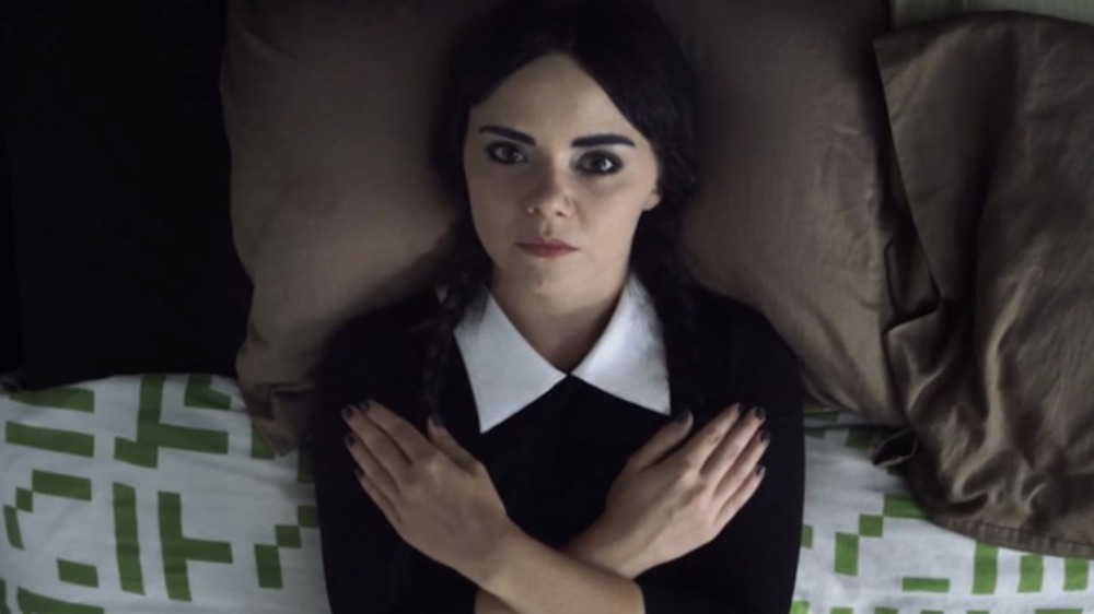 Adult Wednesday on bed