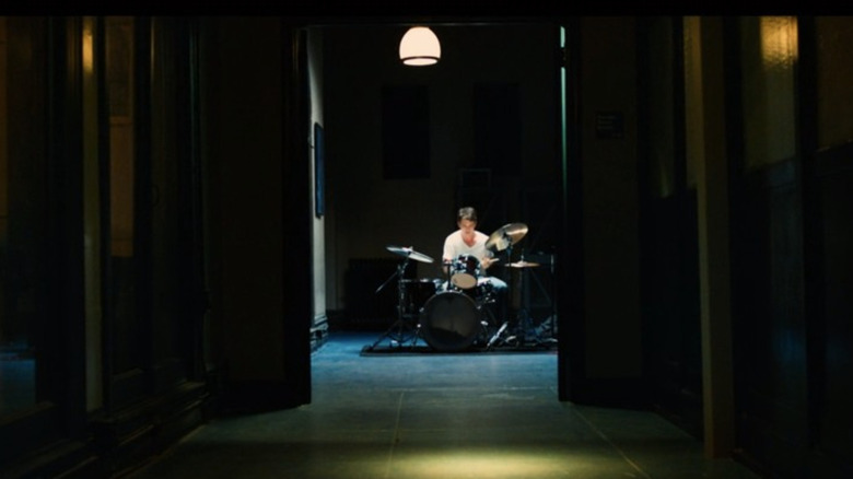Andrew Neiman playing drums