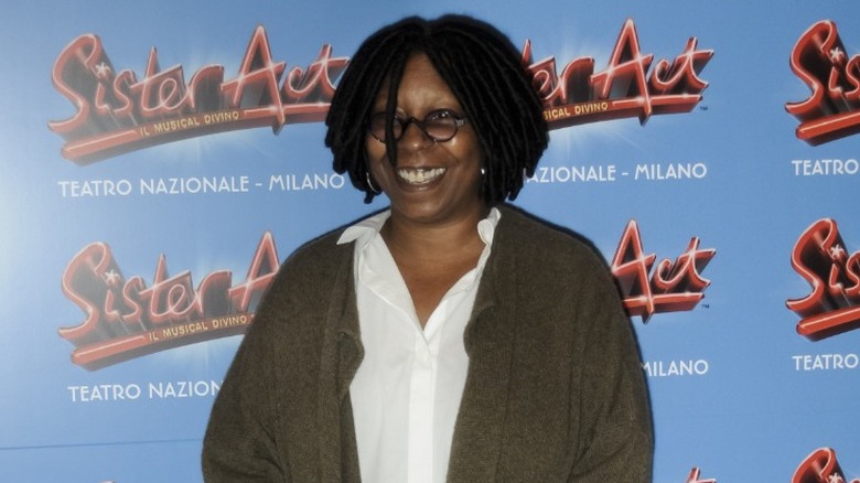 Whoopi Goldberg smiling at event