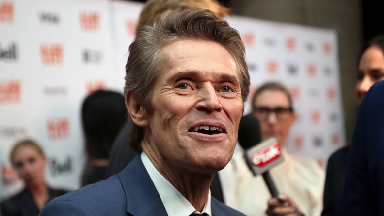 willem dafoe smiles
