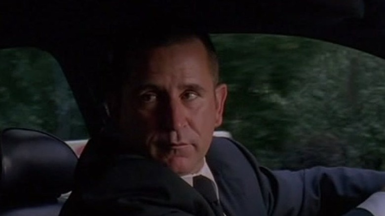 Anthony LaPaglia sitting in a car