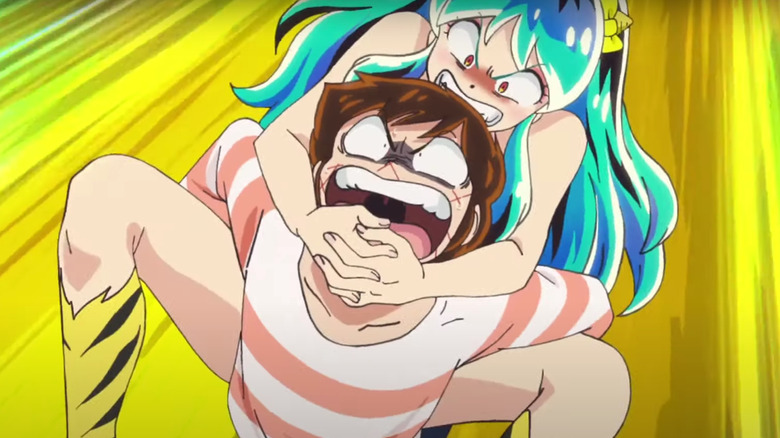Lum wrestles with Ataru