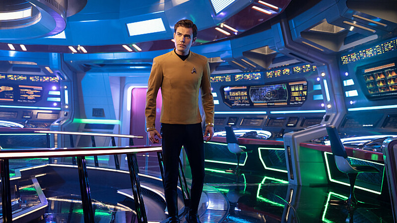 Captain Kirk standing on bridge