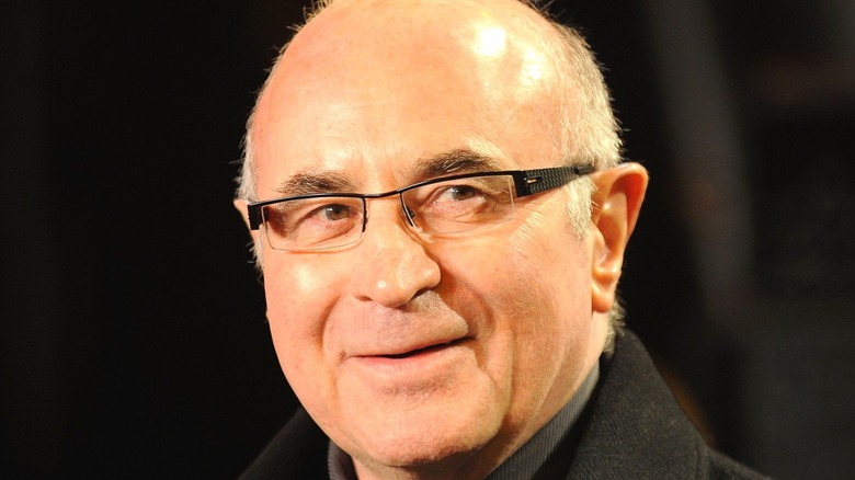 Bob Hoskins wearing glasses