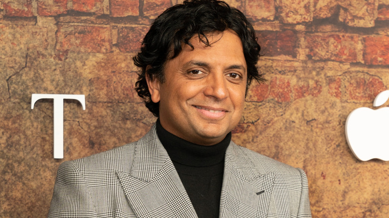 Smiling M. Night Shyamalan