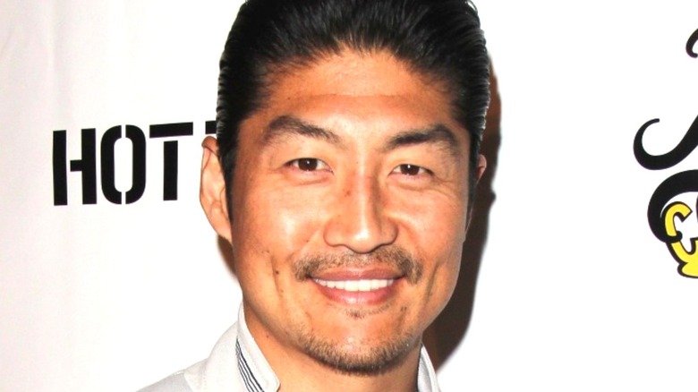 Brian Tee talking during a panel