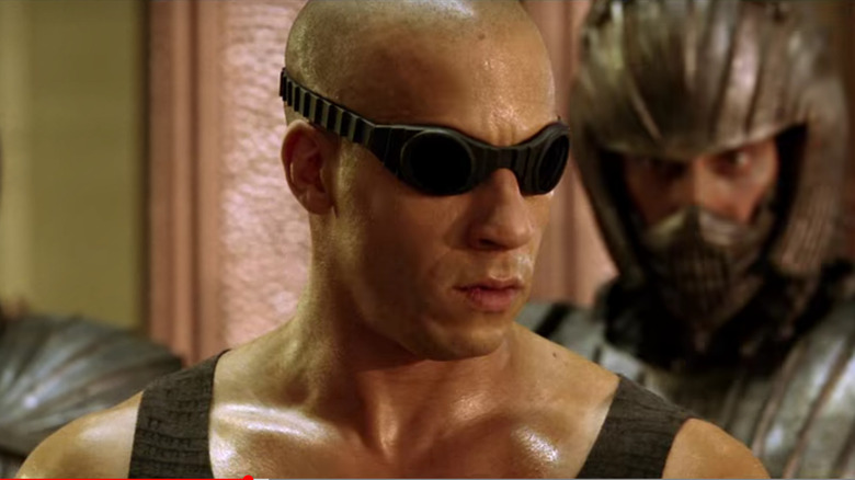 Riddick looks on menacingly