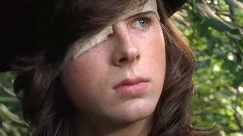 Carl Grimes aka Coral about to kiss Enid