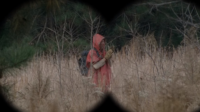 Man in a red poncho on The Walking Dead
