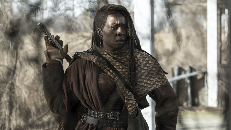 Michonne wielding katana looking concerned