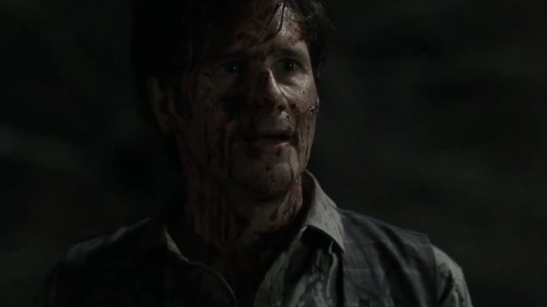 Lance Hornsby covered in blood