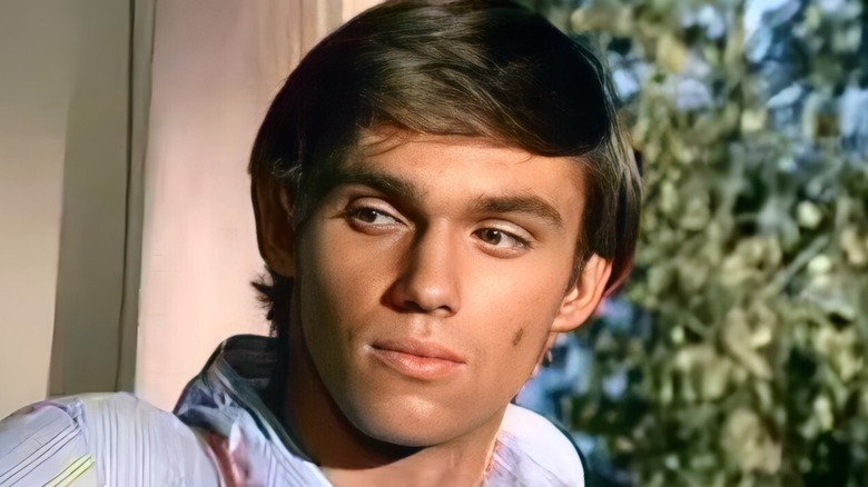 John-Boy wearing blue shirt
