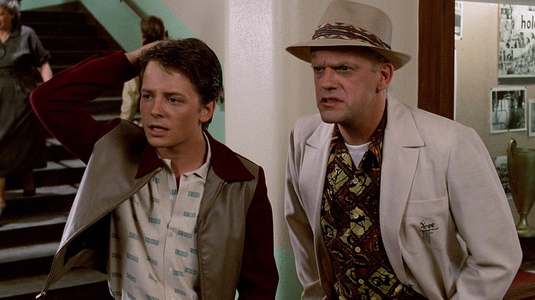 Young Doc Brown and Marty standing together in disguise in Back to the Future