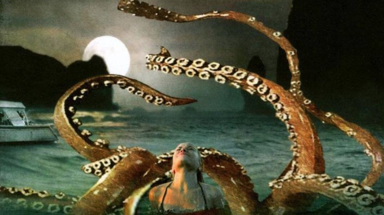 Giant squid attacking a swimmer