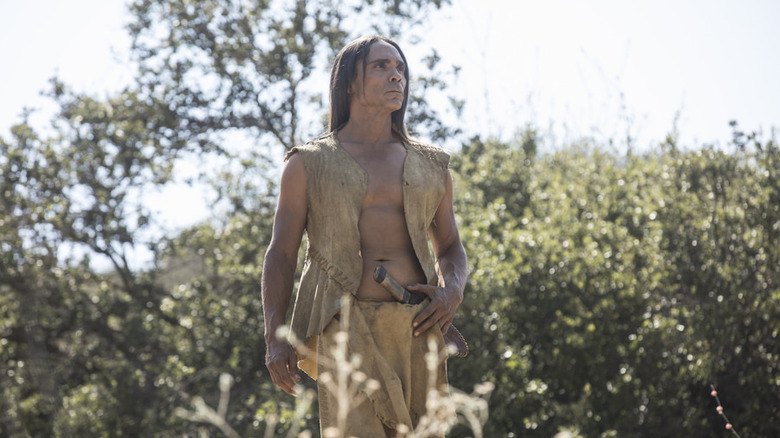 Akecheta with knife looks ahead