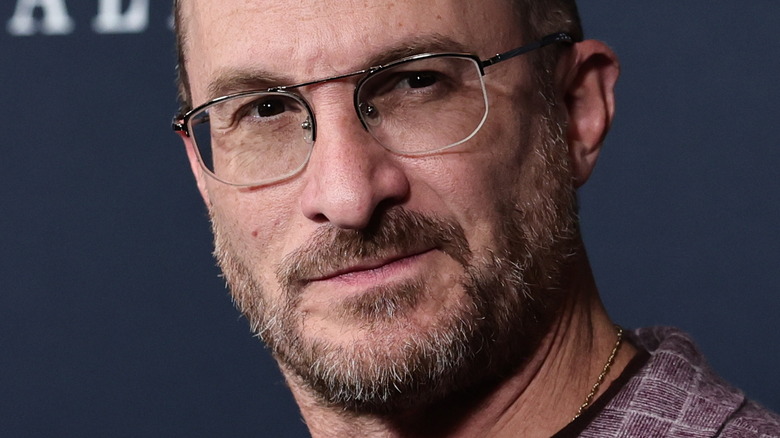 Darren Aronofsky wearing glasses