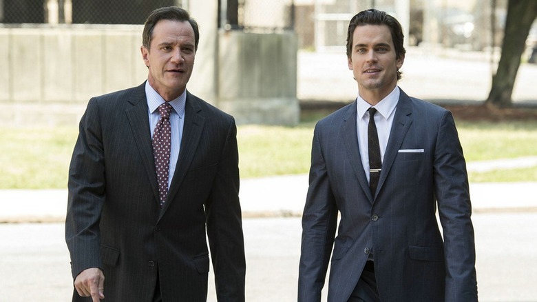 Neal and Peter strolling in "White Collar"