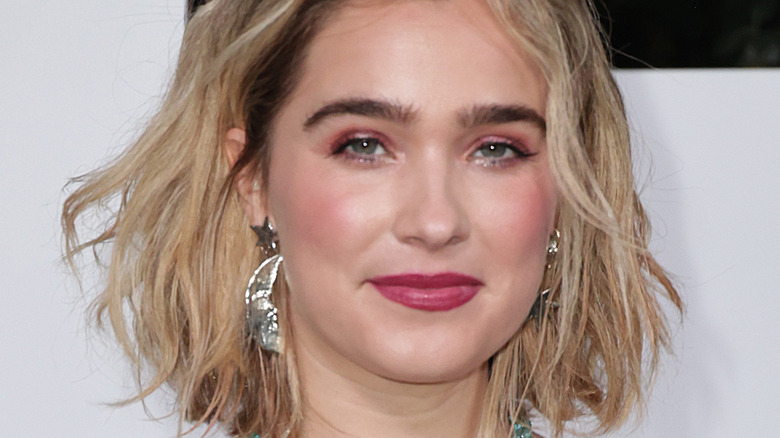 Haley Lu Richardson smiling on red carpet