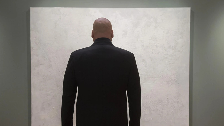 Wilson Fisk looking at the Rabbit in a Snowstorm painting on Daredevil