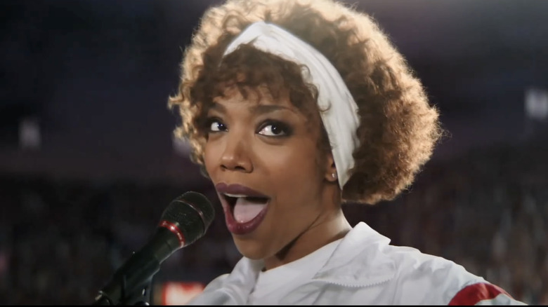 Whitney Houston stinging on stage