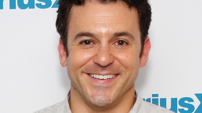 Fred Savage smiling at an event