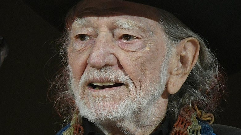 Willie Nelson smirking