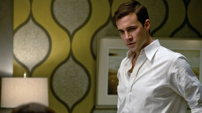Henry Winchester in ugly motel in The Winchesters