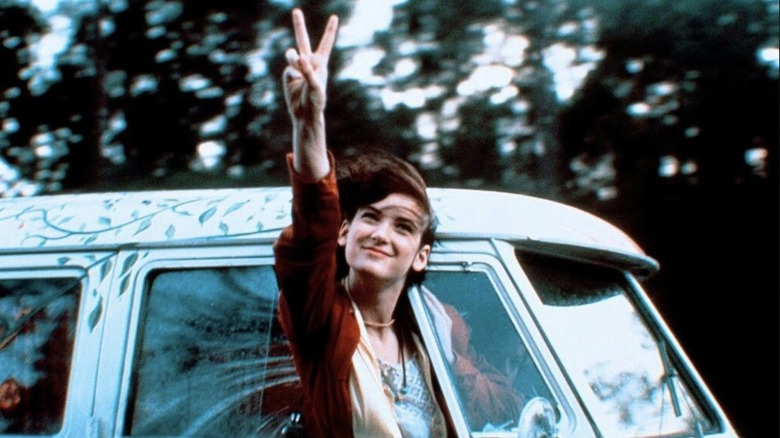 Beth flashing the peace sign