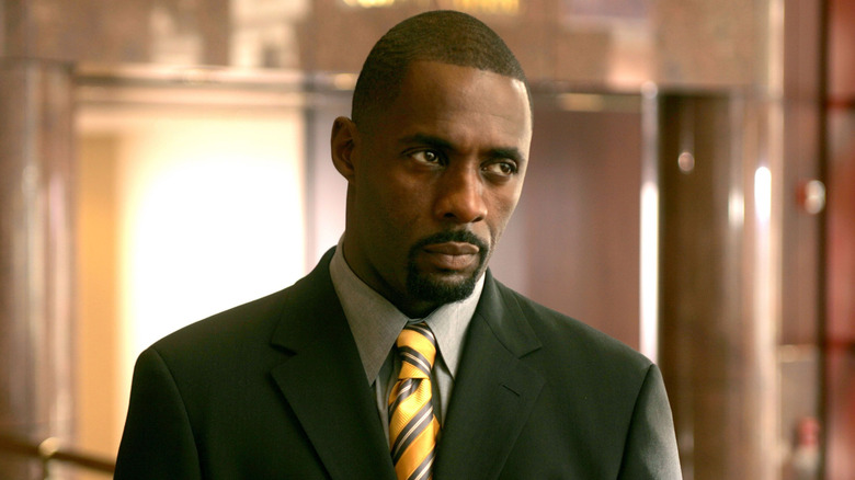 Stringer Bell looking stern in a suit in "The Wire"