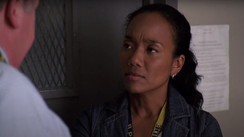 Kima Greggs speaking with someone