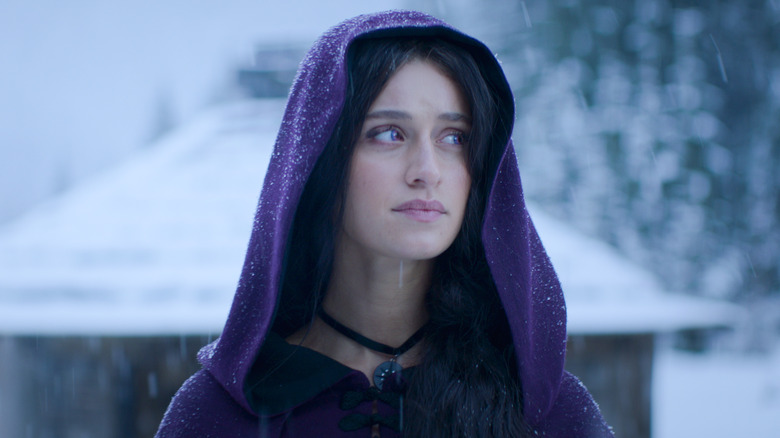 Yennefer wearing a purple cloak