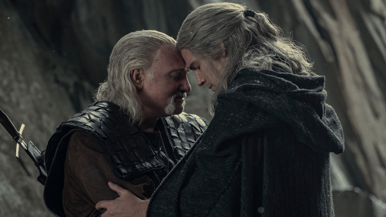 Geralt and Vessemir standing together