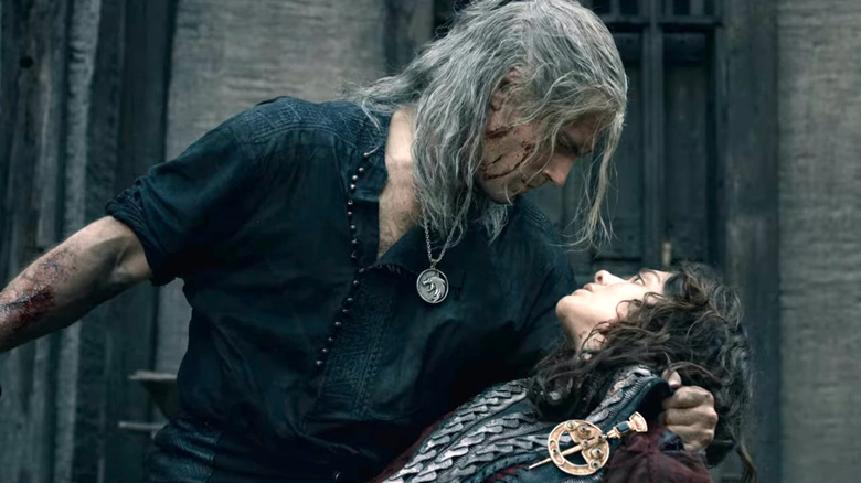 Geralt of Rivia holding Renfri