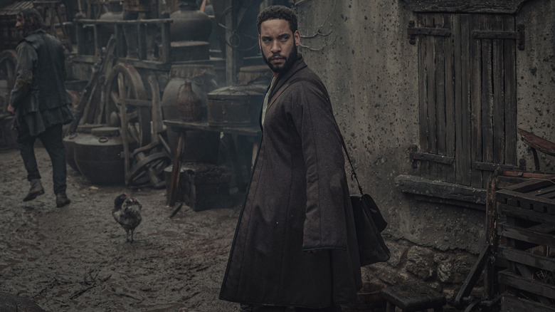 Royce Pierreson as Istredd investigates in The Witcher