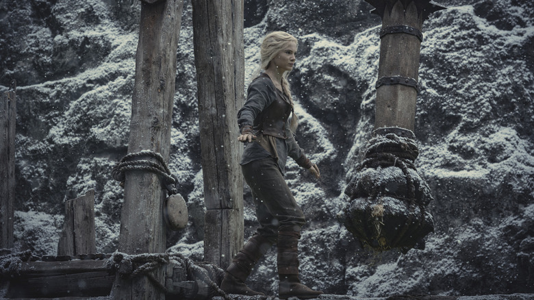 Freya Allan as Ciri balances in The Witcher