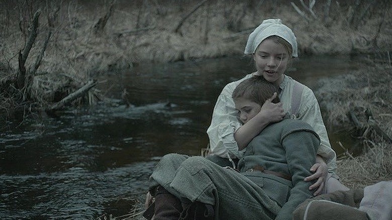 Thomasin comforting Caleb