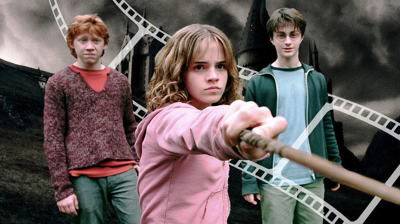 Hermione brandishing her wand