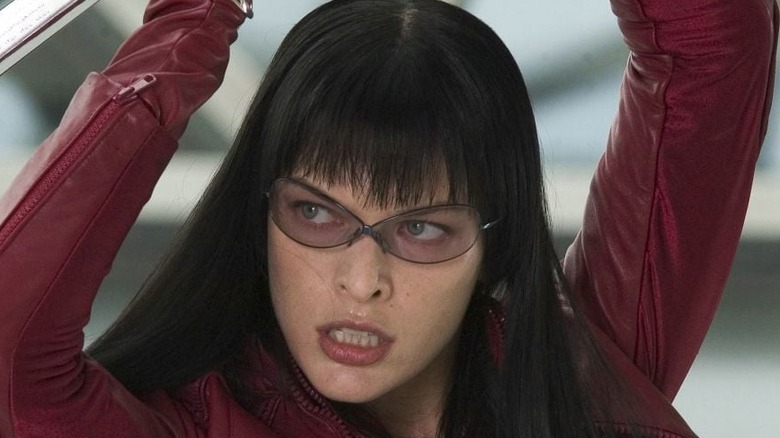 Milla Jovovich raises her sword in Ultraviolet
