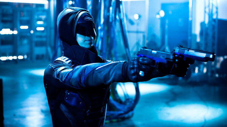 The Phantom aims two guns