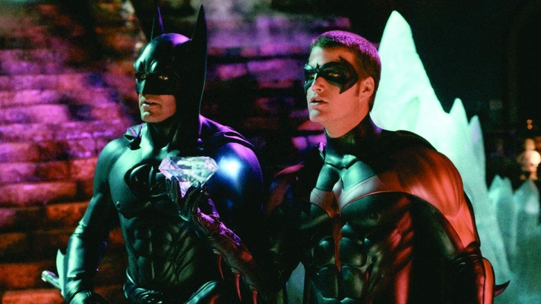 Batman standing next to Robin and a diamond in Batman & Robin (1997)
