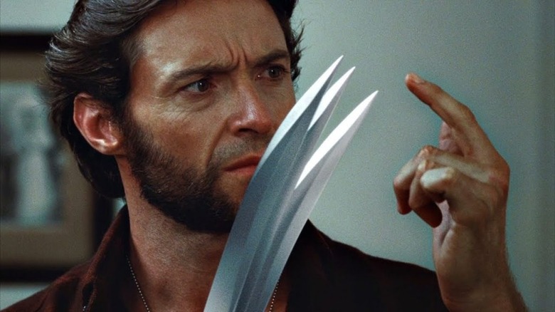 Wolverine inspects his claws